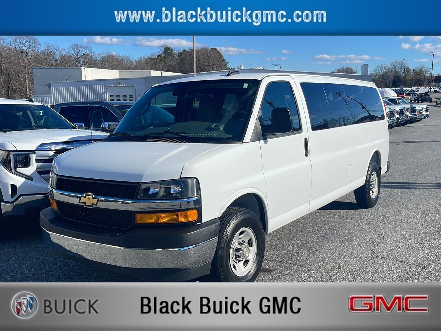 2025 Chevrolet Express Passenger 1LT in Summit White — front three-quarter view