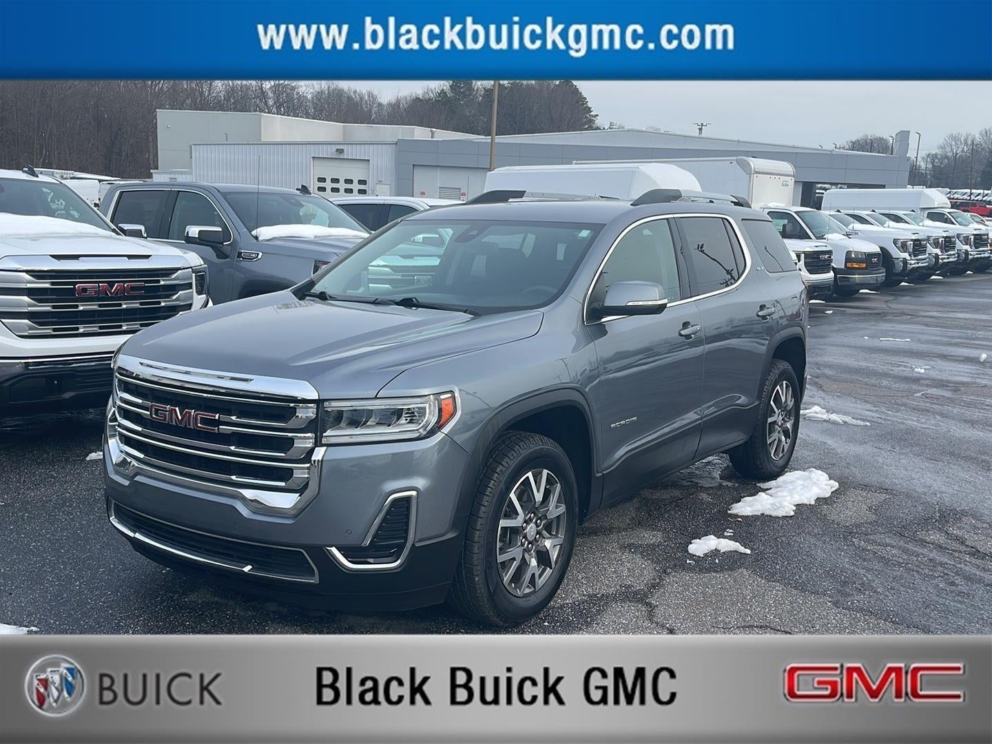 2022 GMC Acadia SLE in Satin Steel Metallic — front three-quarter view