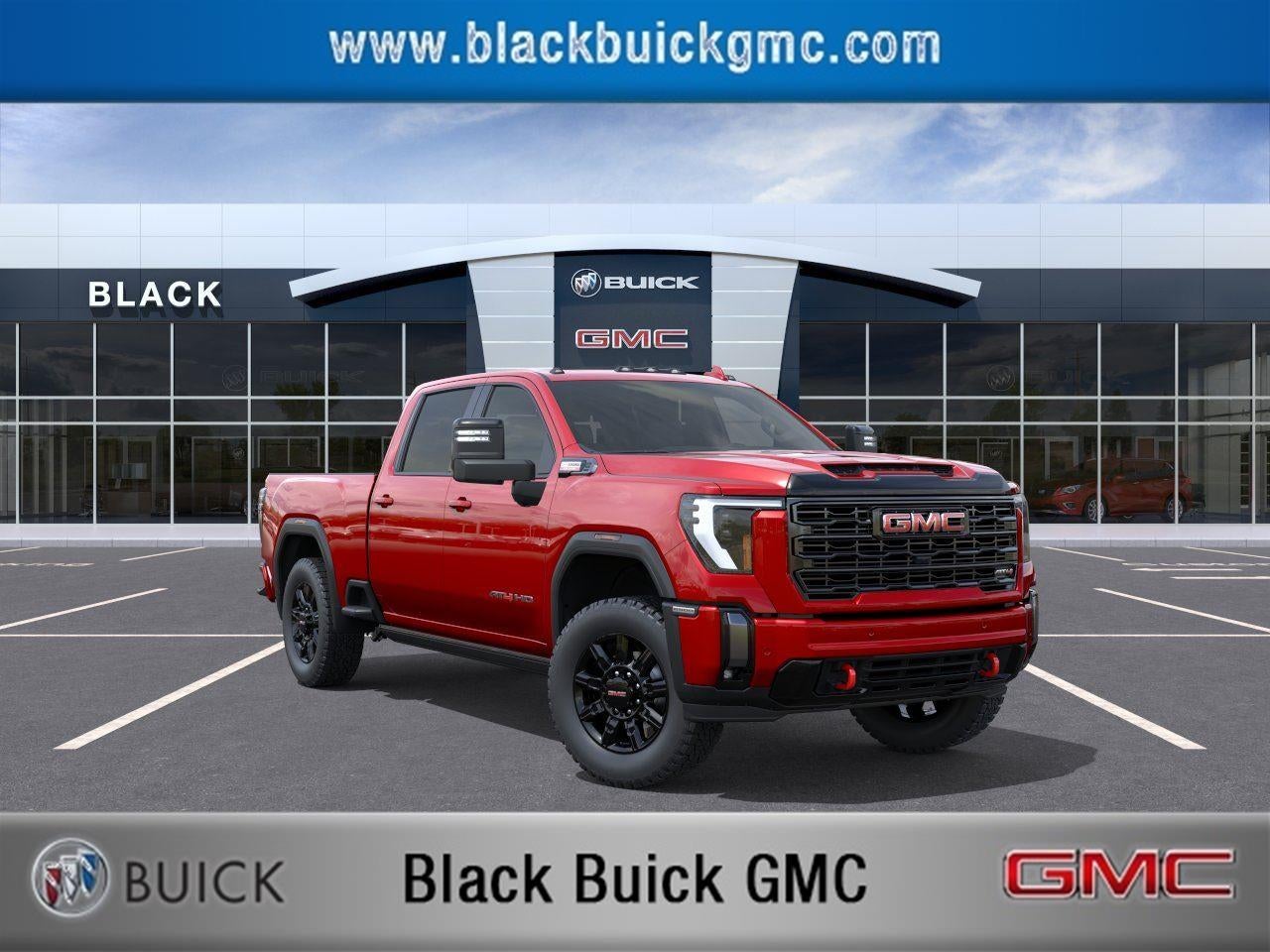 2026 GMC Sierra 2500 HD AT4 in Volcanic Red Tintcoat — front three-quarter view
