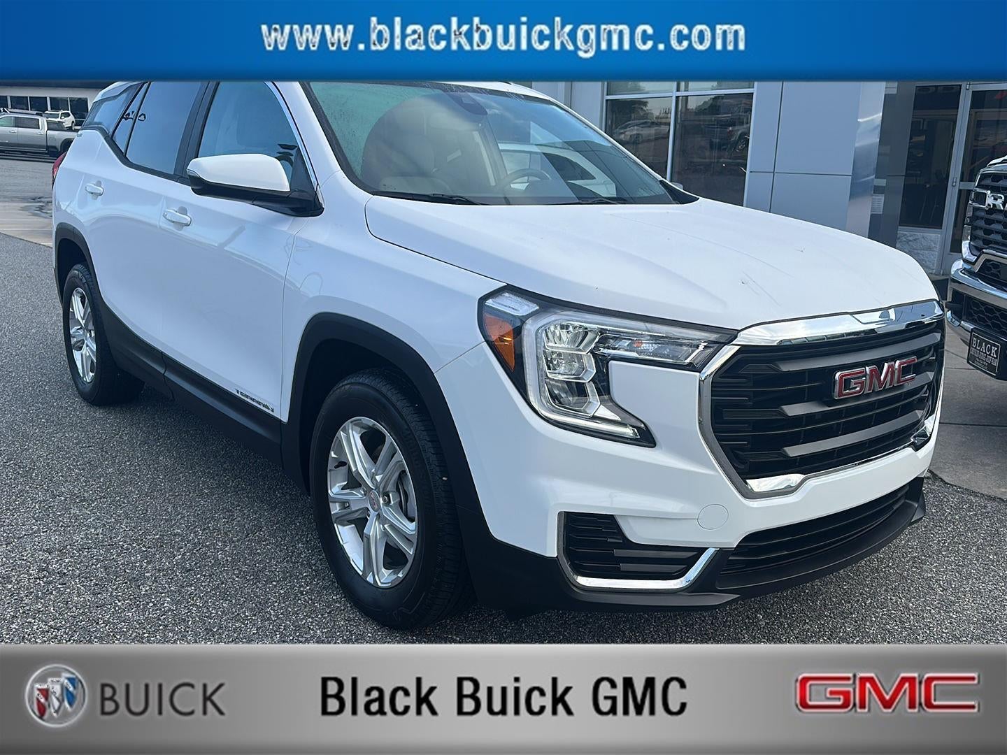 2023 GMC Terrain SLE in Summit White — front three-quarter view