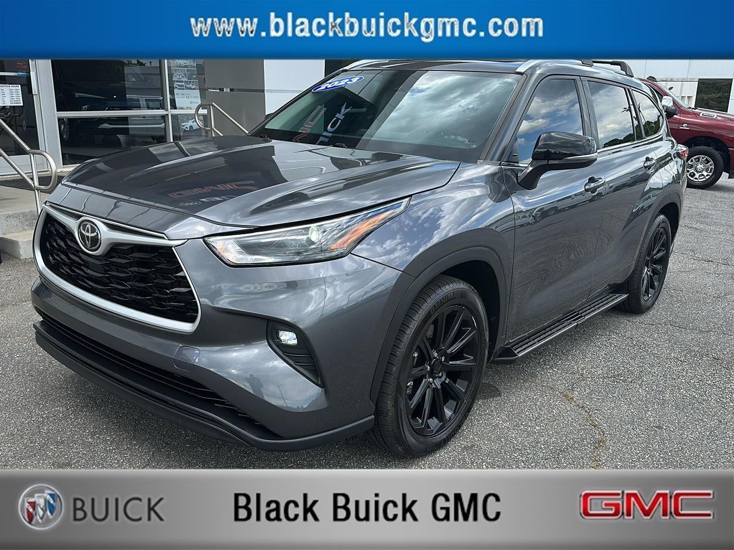 2023 Toyota Highlander L in Black — front three-quarter view