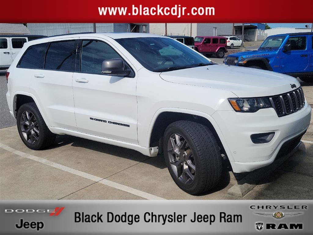 2021 Jeep Grand Cherokee 80th Anniversary 4X4 in Bright White Clearcoat — front three-quarter view
