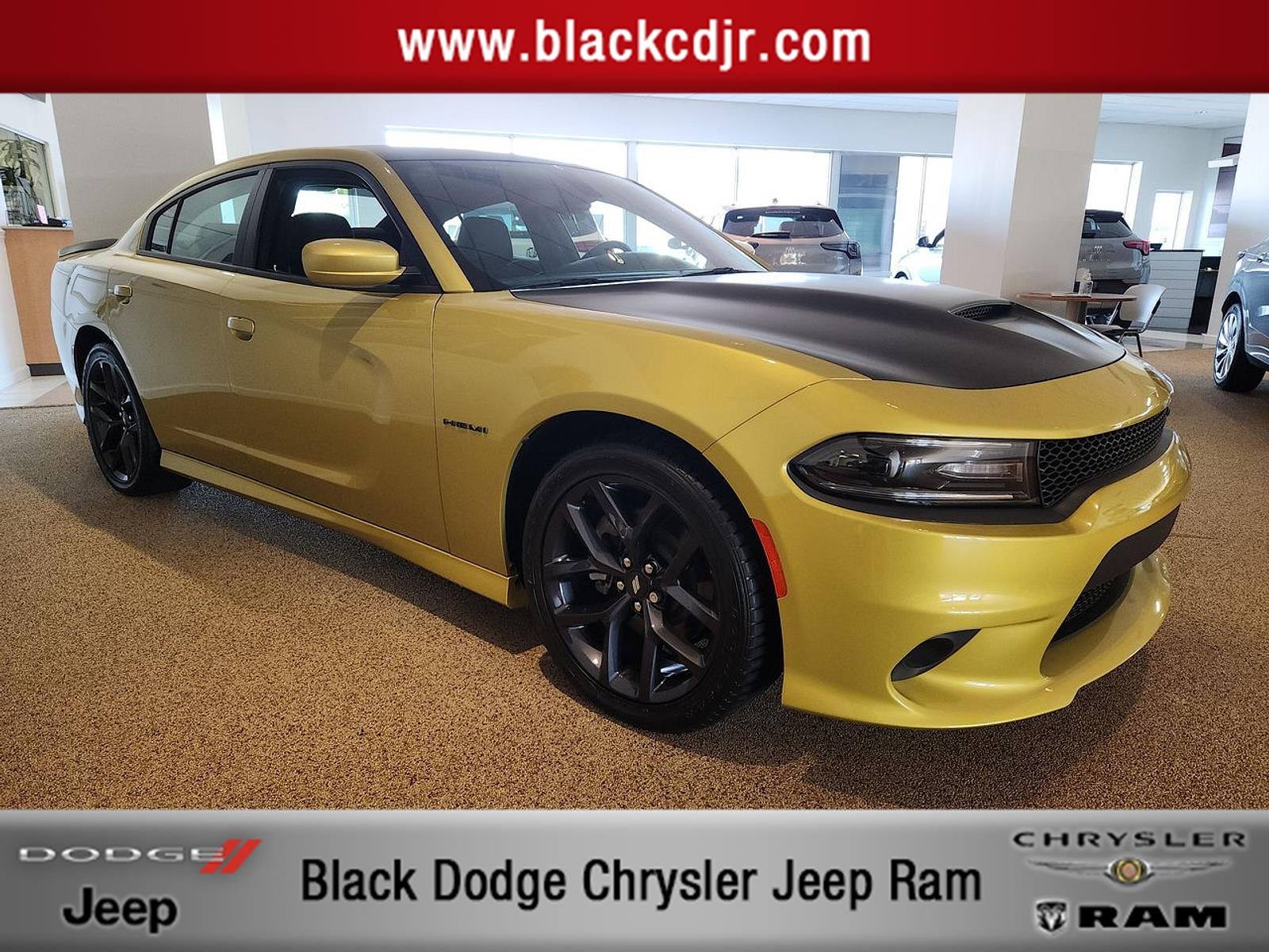 2021 Dodge Charger R/T RWD in Gold Rush Pearlcoat — front three-quarter view