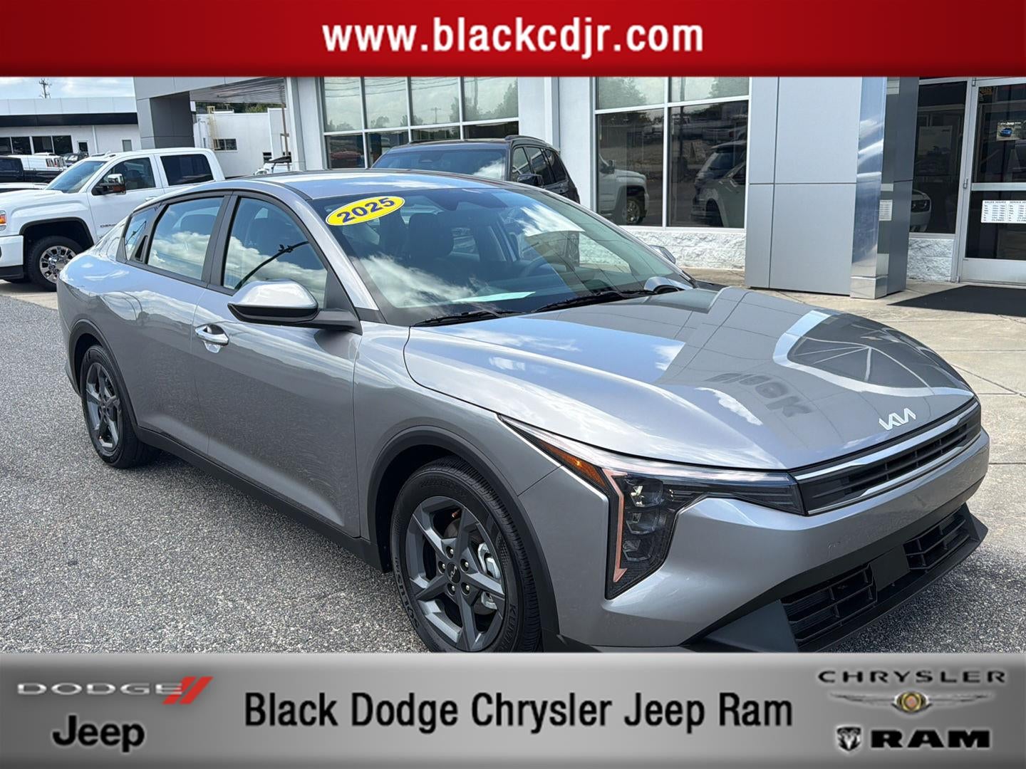 2025 Kia K4 LXS in Steel Gray — front three-quarter view